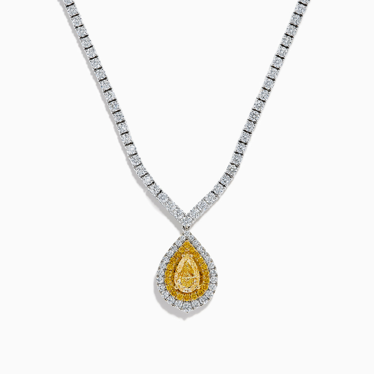 The 18K Two-Tone Gold Yellow and White Diamond Double Halo Necklace features a teardrop-shaped yellow gemstone pendant with a double halo of diamonds, hanging from a white diamond-set chain.