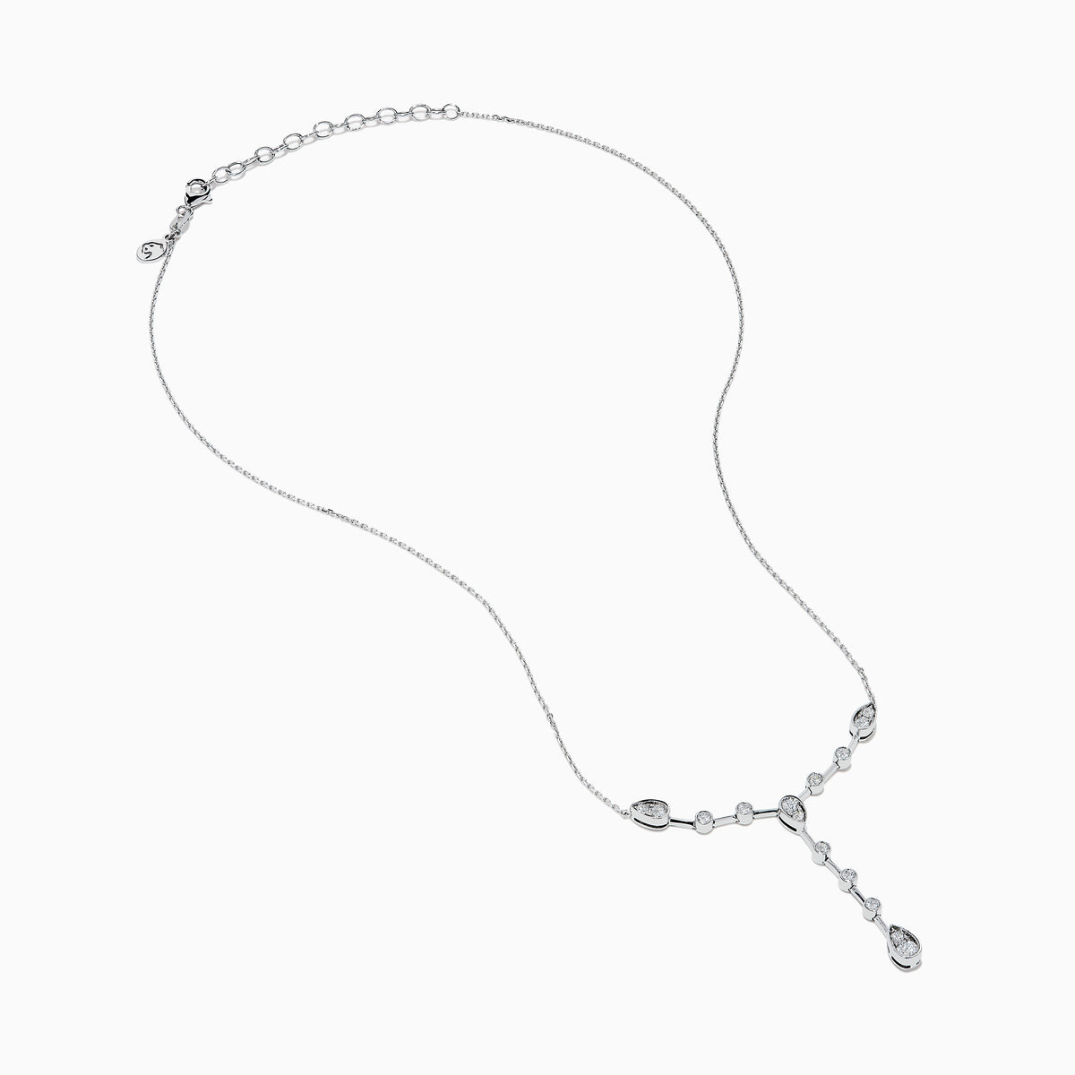 The 14K White Gold Bezel-Set Diamond Lariat Necklace showcases round and teardrop bezel-set diamonds in a Y-shaped design, all gracefully suspended from a delicate chain.