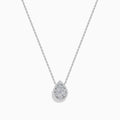 The 14K White Gold Diamond Cluster Pear Shaped Pendant Necklace features a pear-shaped diamond pendant with sparkling accents, set on a delicate white gold chain and shown against a plain white background.