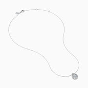 The 14K White Gold Diamond Cluster Pear Shaped Pendant Necklace features a pear-shaped diamond pendant with sparkling accents, set on a delicate white gold chain and shown against a plain white background.