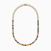 The Watercolor 14K Yellow Gold Multi Sapphire and Diamond Necklace features rectangular, multicolored sapphires and diamonds evenly spaced along its length, showcased on a white background.