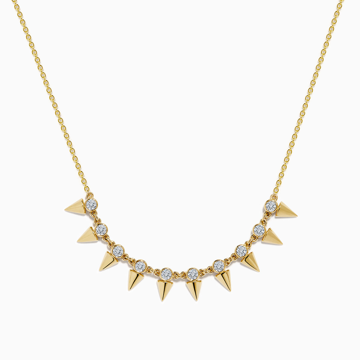 The 14K Yellow Gold Diamond Spike Collarbone Necklace features alternating clear diamonds and gold spike accents on a delicate gold chain.