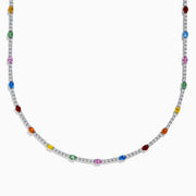 The Watercolors 14K White Gold Multi Sapphire and Diamond Tennis Necklace showcases alternating diamonds and vibrant sapphires in red, blue, green, yellow, orange, and pink along the chain for a lively, colorful look.