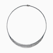 The 925 Sterling Silver Diamond Accented Necklace is a modern, elegant piece with a textured, curved front and sparkling stones on a sleek segmented band.