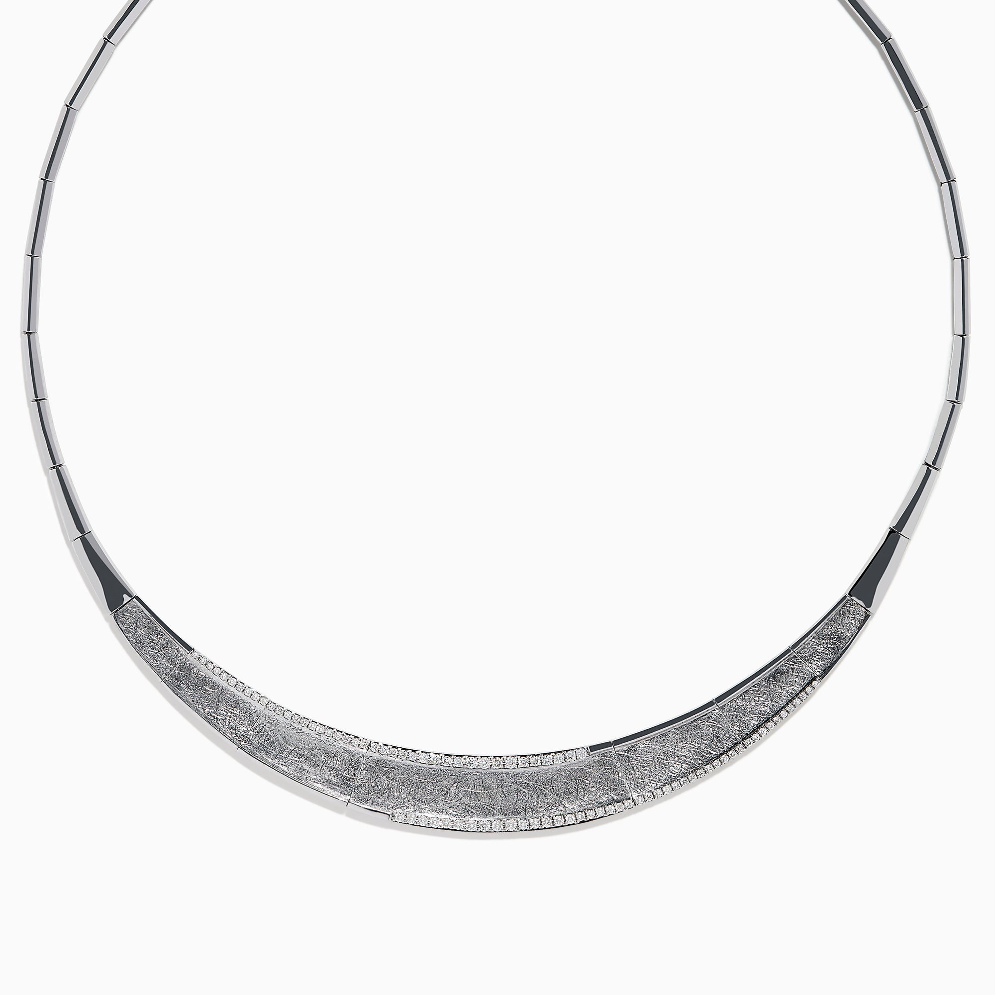 The 925 Sterling Silver Diamond Accented Necklace is a modern, elegant piece with a textured, curved front and sparkling stones on a sleek segmented band.