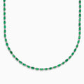The 925 Sterling Silver Emerald and Diamond Tennis Necklace showcases a sleek row of oval green emeralds and sparkling diamonds set in sterling silver, beautifully arranged against a crisp white background.