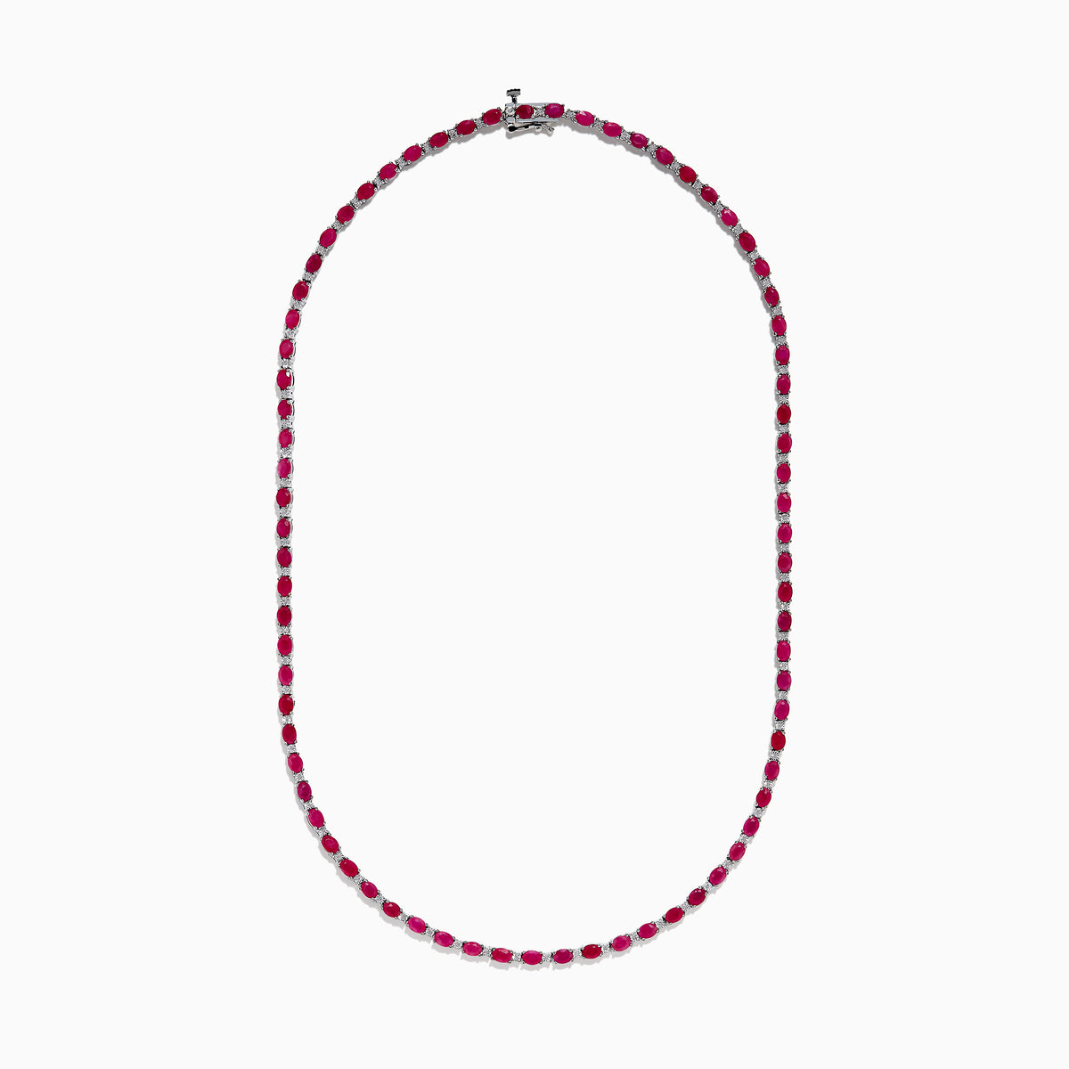 The 925 Sterling Silver Ruby and Diamond Tennis Necklace showcases a continuous row of oval red gemstones in silver prong settings, elegantly displayed against a white background.