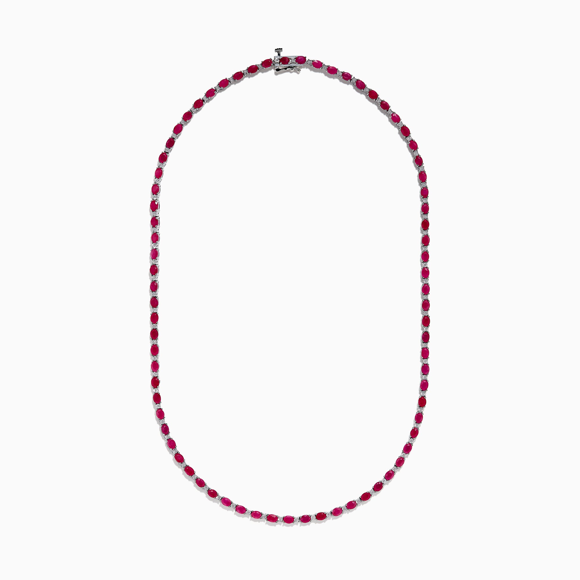The 925 Sterling Silver Ruby and Diamond Tennis Necklace showcases a continuous row of oval red gemstones in silver prong settings, elegantly displayed against a white background.