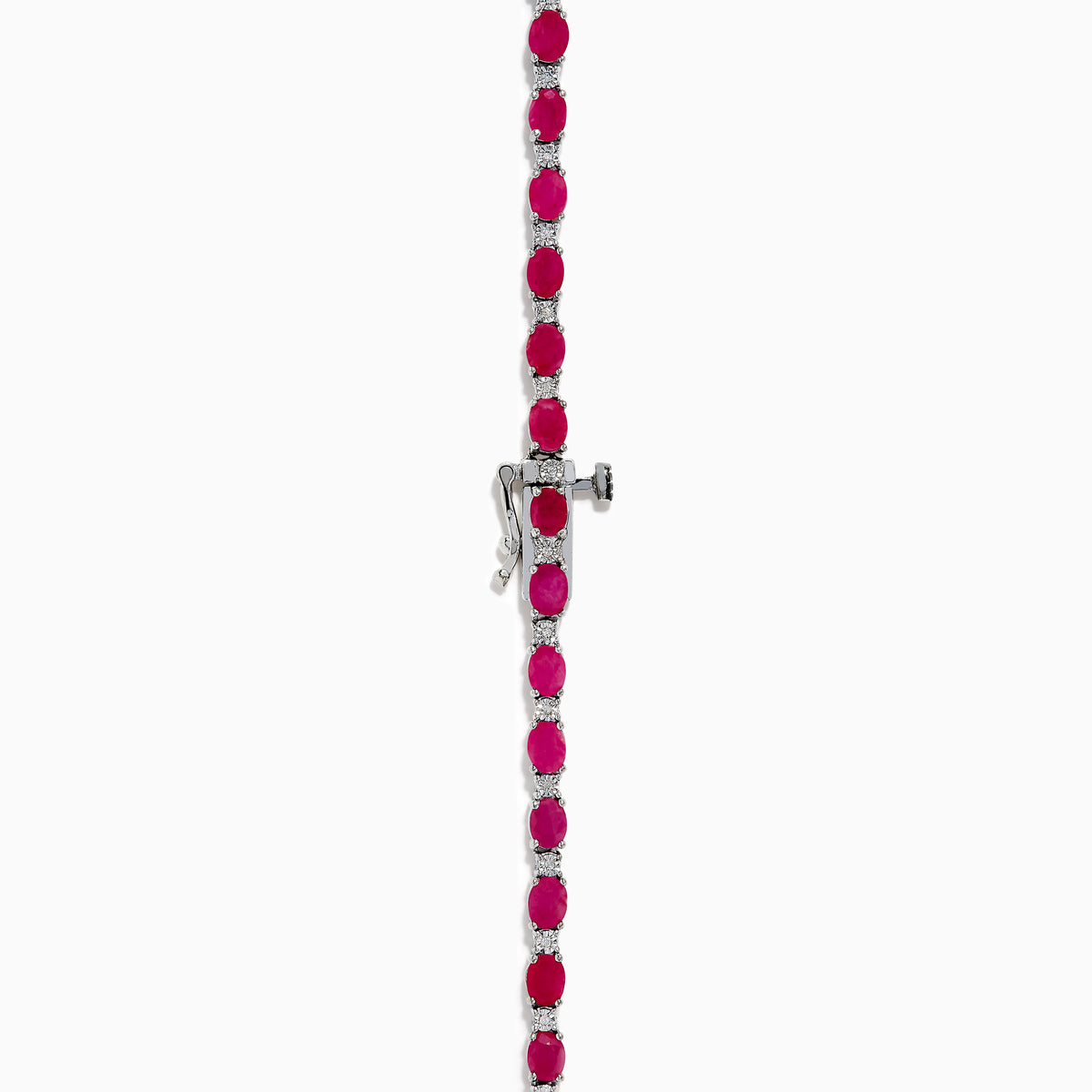 The 925 Sterling Silver Ruby and Diamond Tennis Necklace showcases a continuous row of oval red gemstones in silver prong settings, elegantly displayed against a white background.
