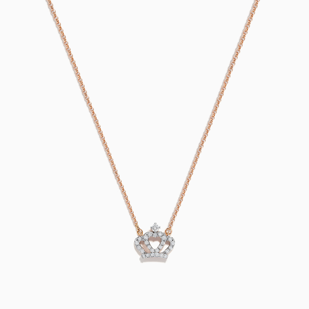 The Novelty 14K Rose Gold Diamond Crown Necklace features a delicate chain and crown-shaped pendant adorned with small sparkling stones, a heart motif at the center, and a single larger stone at the top.