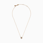 The Signature 14K Rose Gold Diamond Panther Pendant features a delicate chain and a detailed panther pendant with diamond accents and green gemstone eyes, shown against a white background.