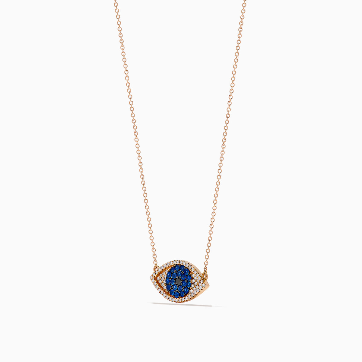The Novelty 14K Rose Gold Blue Sapphire and Diamond Evil Eye Necklace features a blue sapphire center with sparkling diamonds, elegantly blending protection and style.