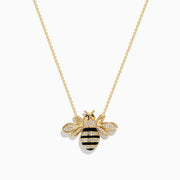 The 14K Yellow Gold Black and White Diamond Bee Necklace features a gold chain with a bee pendant adorned with black and white diamond accents, delicate stripes, and intricate detailing on the head and body. The pendant is symmetrically suspended from the elegant chain in classic Effy style, adding a touch of whimsical elegance.