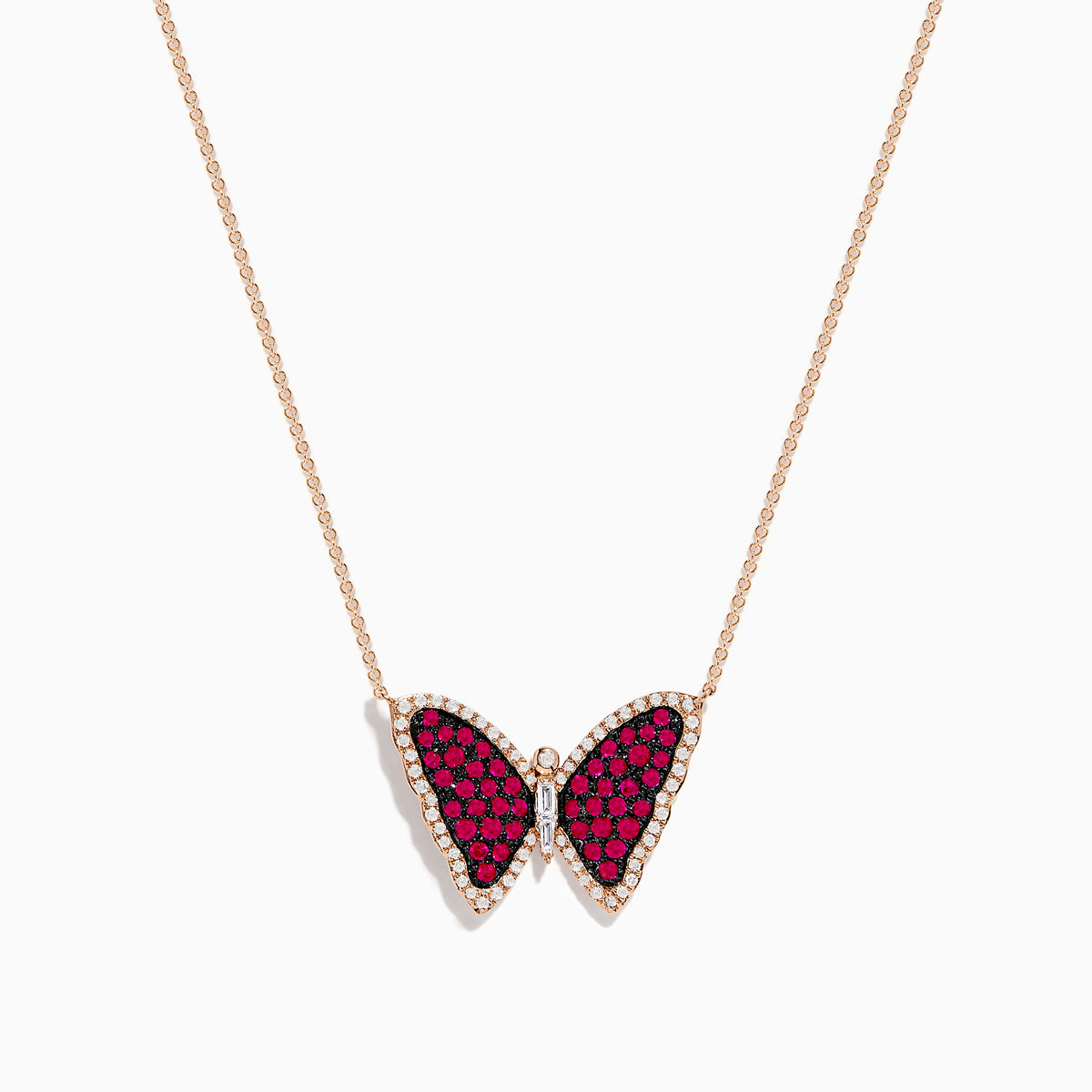The Ruby Royale 14K Rose Gold Ruby Butterfly Necklace features a butterfly pendant with vivid red and black stones, accented by clear crystals on a delicate rose gold chain.