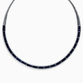 The Royale Bleu 14K White Gold Blue Sapphire and Diamond Necklace features rectangular blue sapphires in a row, bordered by sparkling diamonds in a semi-rigid collar design.