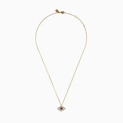 The Espresso 14K Yellow Gold Diamond Evil Eye Pendant features black and white diamonds in an eye-shaped design, creating a sparkling and stylish necklace.
