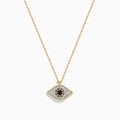 The Espresso 14K Yellow Gold Diamond Evil Eye Pendant features black and white diamonds in an eye-shaped design, creating a sparkling and stylish necklace.