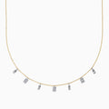 The 14K Two Tone Gold Dangling Diamonds Necklace features seven dainty rectangular diamond pendants evenly spaced along a 14K gold chain, each set with sparkling diamonds. Displayed against a white background.