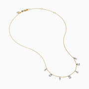 The 14K Two Tone Gold Dangling Diamonds Necklace features seven dainty rectangular diamond pendants evenly spaced along a 14K gold chain, each set with sparkling diamonds. Displayed against a white background.