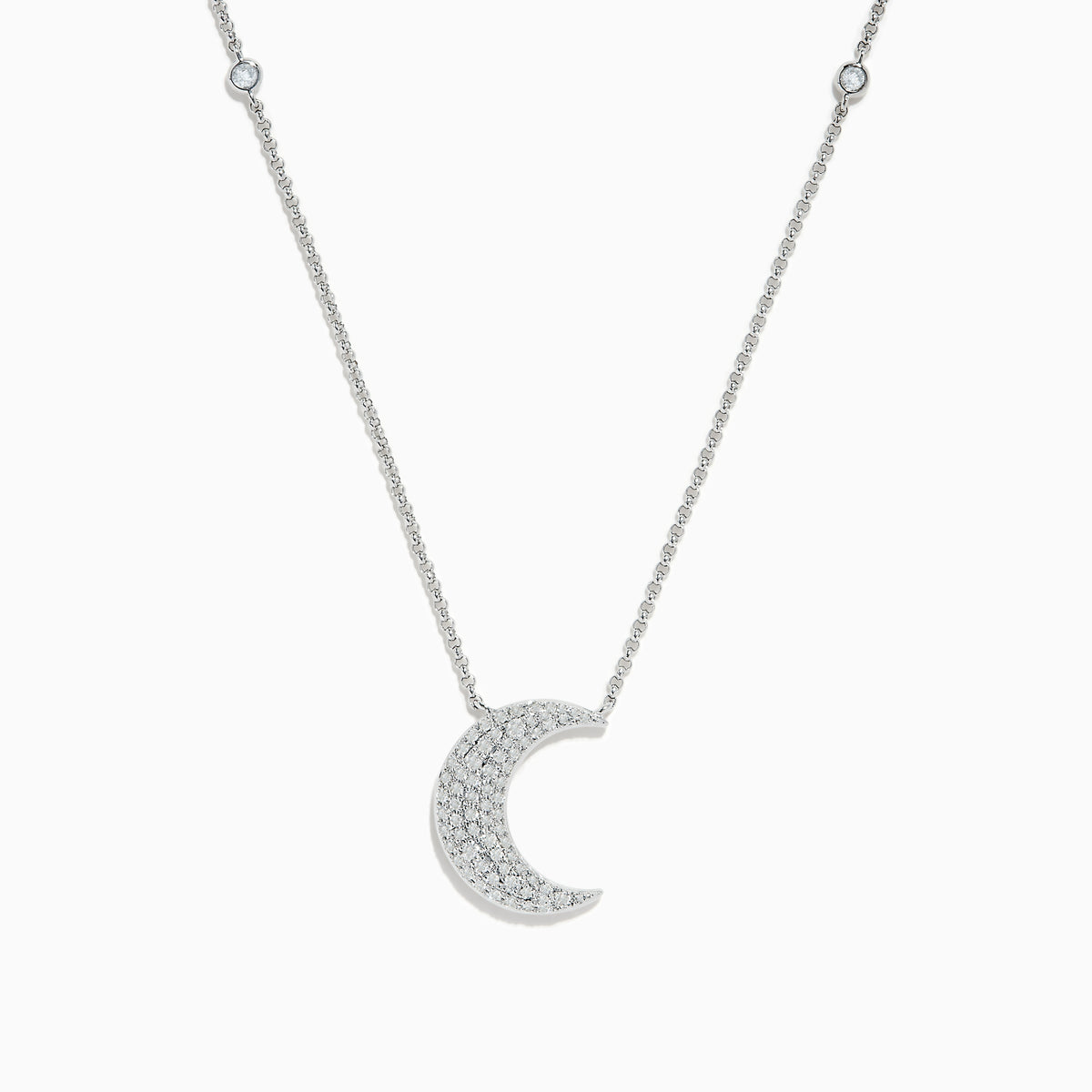 The Novelty 14K White Gold Diamond Crescent Moon Necklace features a delicate crescent pendant with sparkling diamonds and two small round gems set along the chain—a charming choice for any occasion.