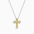 The 14K White Gold Yellow and White Diamond Cross Necklace features a white gold cross pendant with yellow and white diamonds, hanging from a matching chain.