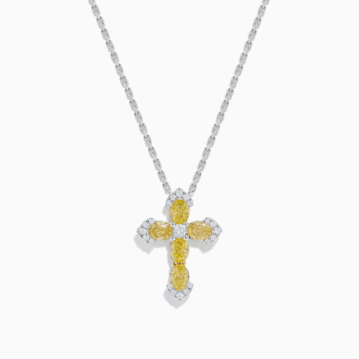 The 14K White Gold Yellow and White Diamond Cross Necklace features a white gold cross pendant with yellow and white diamonds, hanging from a matching chain.