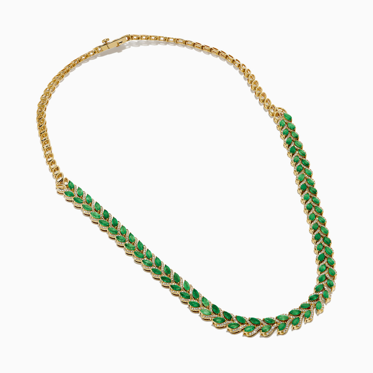 The 14K White Gold Emerald and Diamond Marquise Leaf Necklace features alternating green emeralds and white diamonds in a woven leaf pattern, elegantly displayed against a white background.