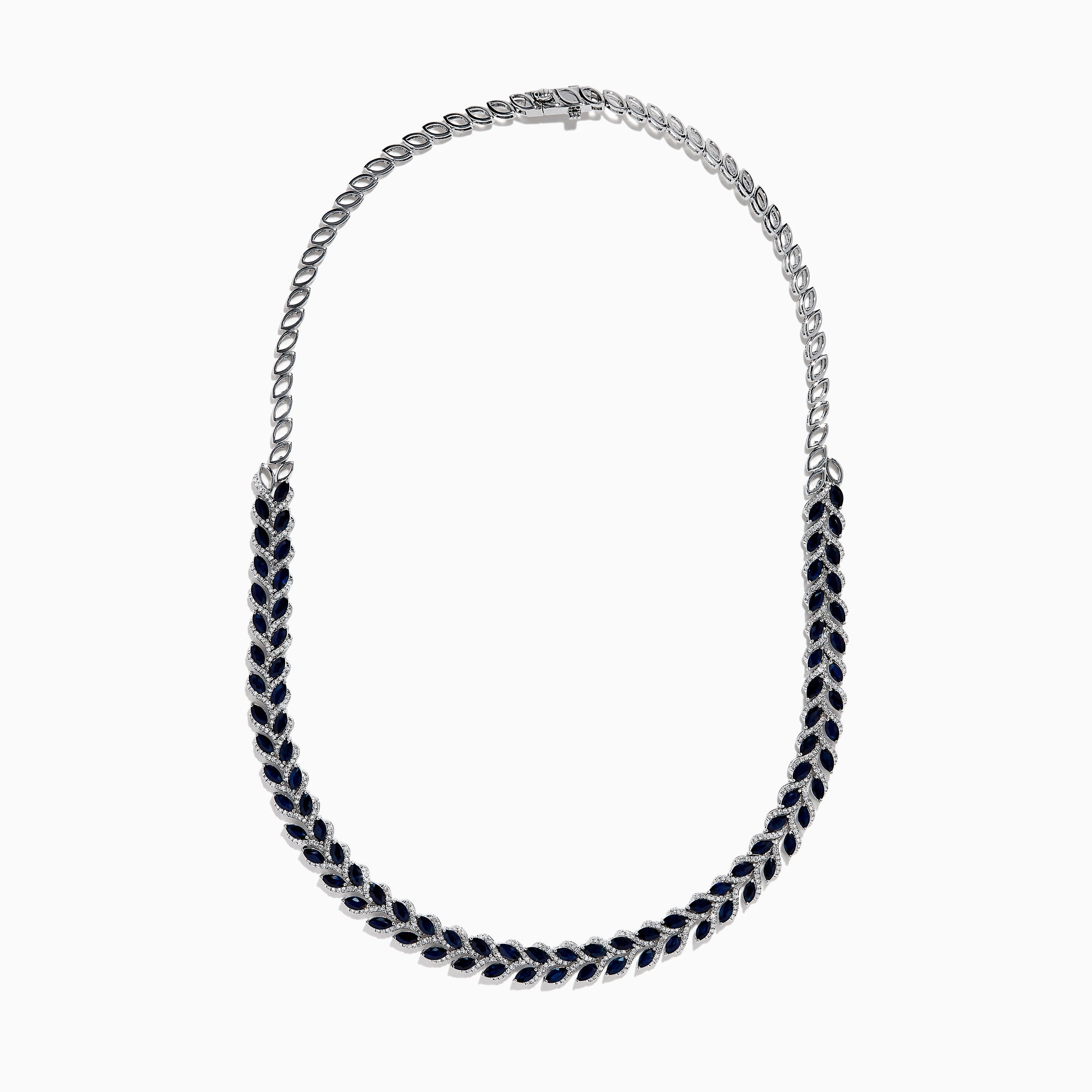 The 14K White Gold Blue Sapphire and Diamond Leaf Motif Necklace showcases a graceful, leaf-inspired design with alternating rows of blue sapphires and diamond accents for a sparkling, elegant look.