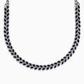 The 14K White Gold Blue Sapphire and Diamond Leaf Motif Necklace showcases a graceful, leaf-inspired design with alternating rows of blue sapphires and diamond accents for a sparkling, elegant look.
