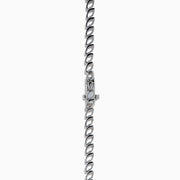 The 14K White Gold Blue Sapphire and Diamond Leaf Motif Necklace showcases a graceful, leaf-inspired design with alternating rows of blue sapphires and diamond accents for a sparkling, elegant look.