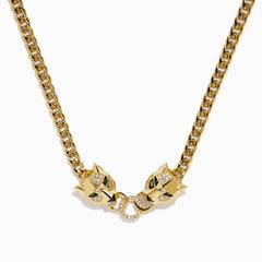 The Signature 14K Yellow Gold Diamond and Tsavorite Panther Necklace features two panther heads with tsavorite green eyes and diamond accents, each biting interlocking diamond-encrusted rings at the center.