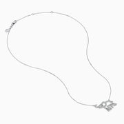 The Novelty 14K White Gold Diamond Elephant Necklace features an elephant-shaped pendant with sparkling stones on a delicate chain, showcased against a white background.