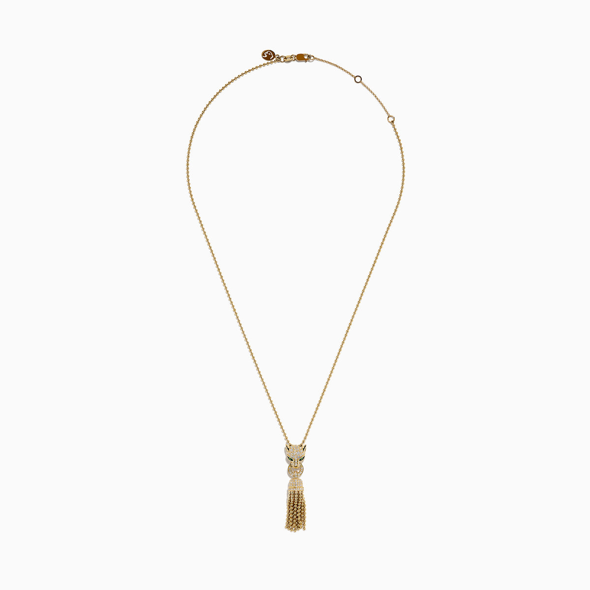 The Web Exclusive 14K Yellow Gold Diamond and Emerald Lariat Tassel Panther Pendant features a diamond-encrusted panther head with emerald eyes, holding a sparkling ring and gold beaded tassels below.