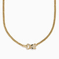 The Signature 14K Yellow Gold Diamond Panther Cuban Chain Necklace features a diamond panther clasp with sparkling stones and green gemstone eyes at the center bottom.