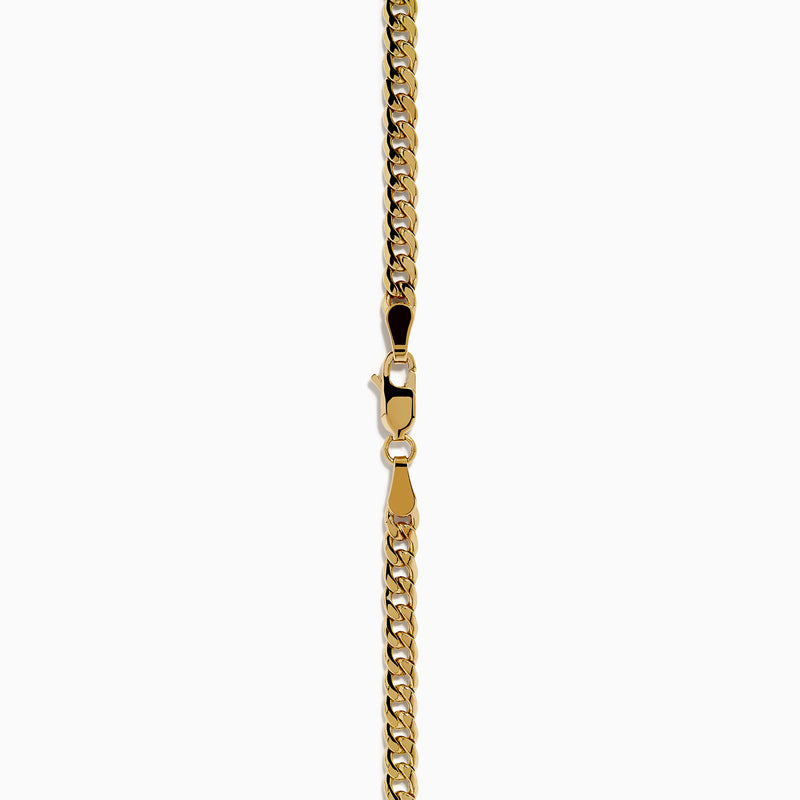 The Signature 14K Yellow Gold Diamond Panther Cuban Chain Necklace features a diamond panther clasp with sparkling stones and green gemstone eyes at the center bottom.