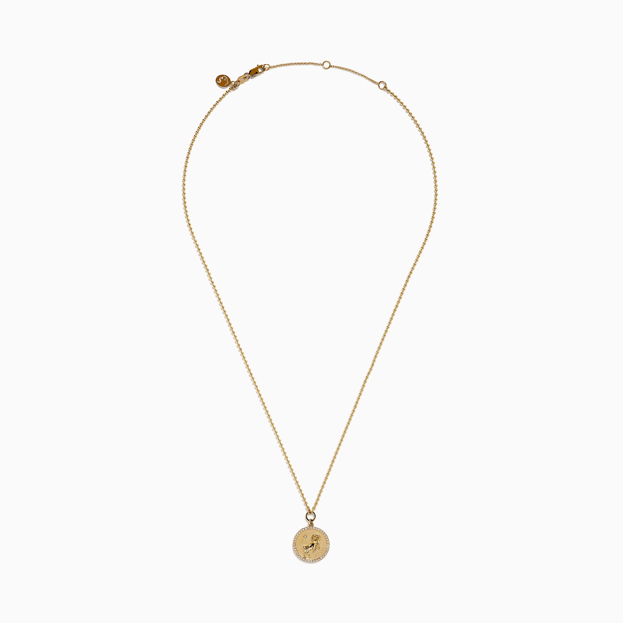 The Zodiac 14K Yellow Gold and Diamond Aries Necklace features a round pendant with an embossed ram, accented by sparkling diamonds, hanging from a delicate gold chain against a white background.