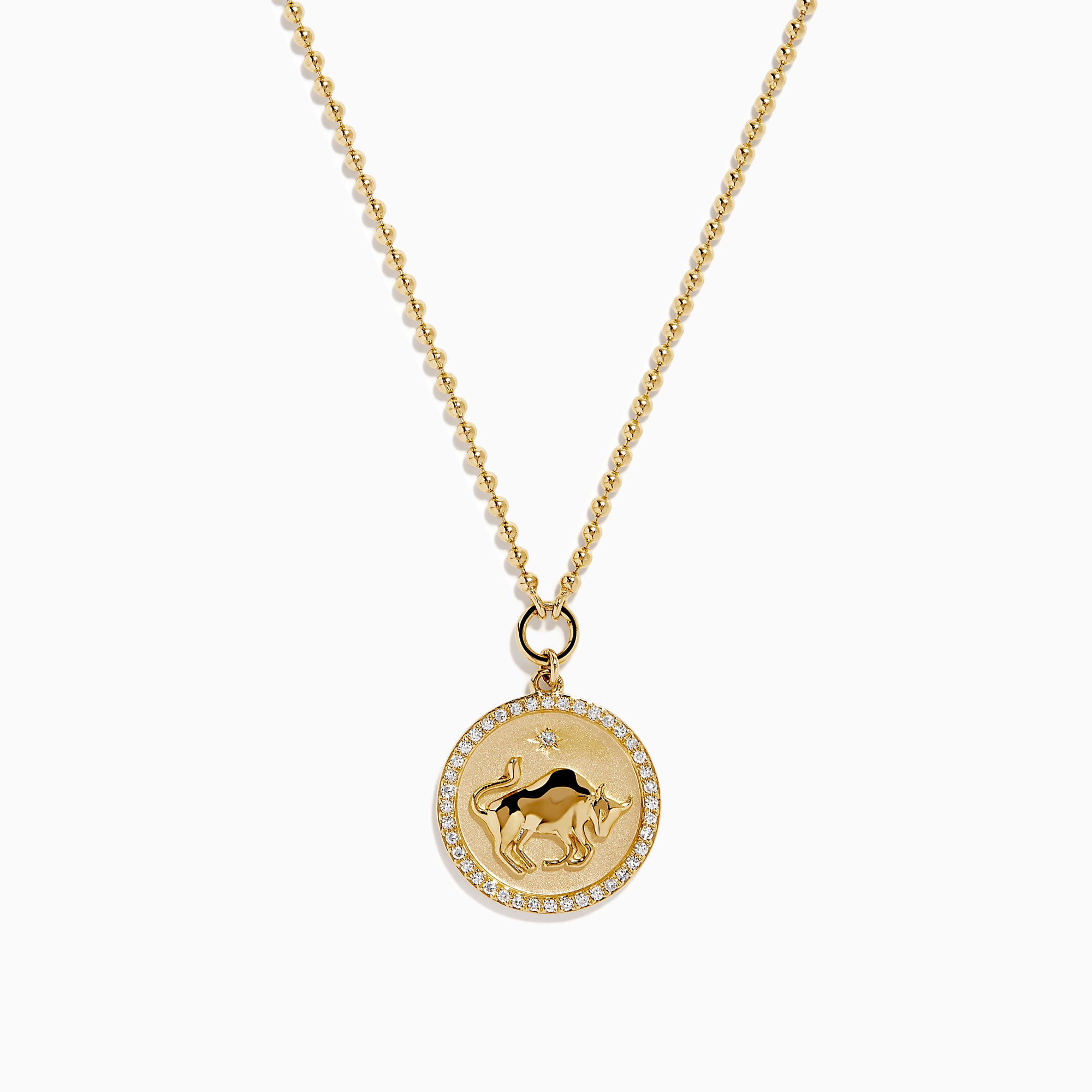 The Zodiac 14K Yellow Gold and Diamond Taurus Necklace features a round pendant with an engraved fish design, accented by diamonds, and hangs from a delicate gold chain on a white background.