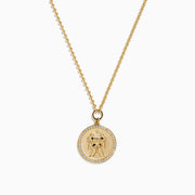 The Zodiac 14K Yellow Gold and Diamond Gemini Necklace features a round pendant with an engraved Gemini design, highlighted by sparkling diamonds for an elegant, refined look.