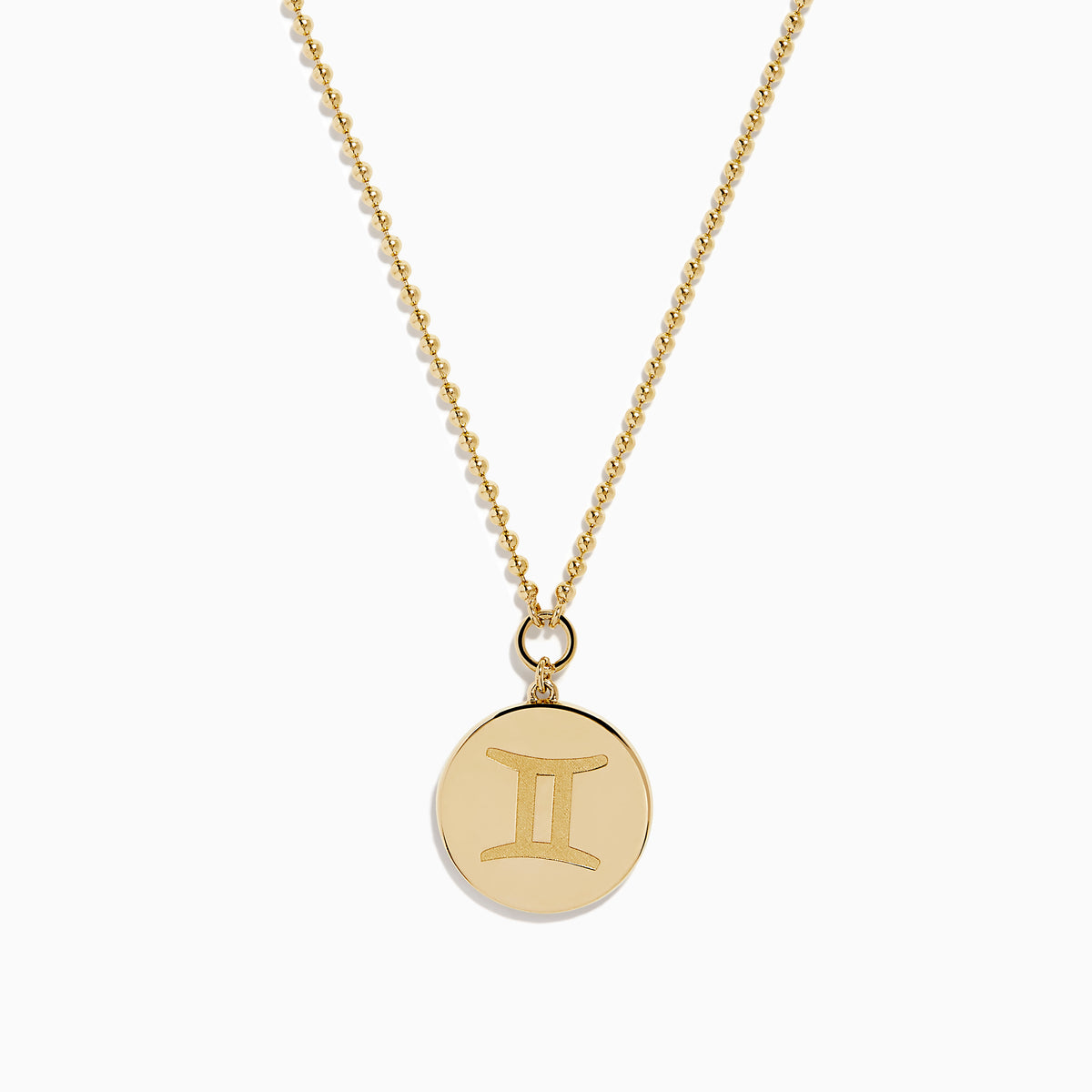 The Zodiac 14K Yellow Gold and Diamond Gemini Necklace features a round pendant with an engraved Gemini design, highlighted by sparkling diamonds for an elegant, refined look.