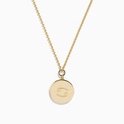 The Zodiac 14K Yellow Gold and Diamond Cancer Necklace features a round pendant with a winged cup design, accented by diamonds. Its delicate chain and zodiac style make it a perfect, personal accessory.