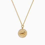 The Zodiac 14K Yellow Gold and Diamond Leo Necklace features a round pendant with an embossed lion design, bordered by sparkling diamonds on a delicate gold chain—an ideal statement piece for any Leo.