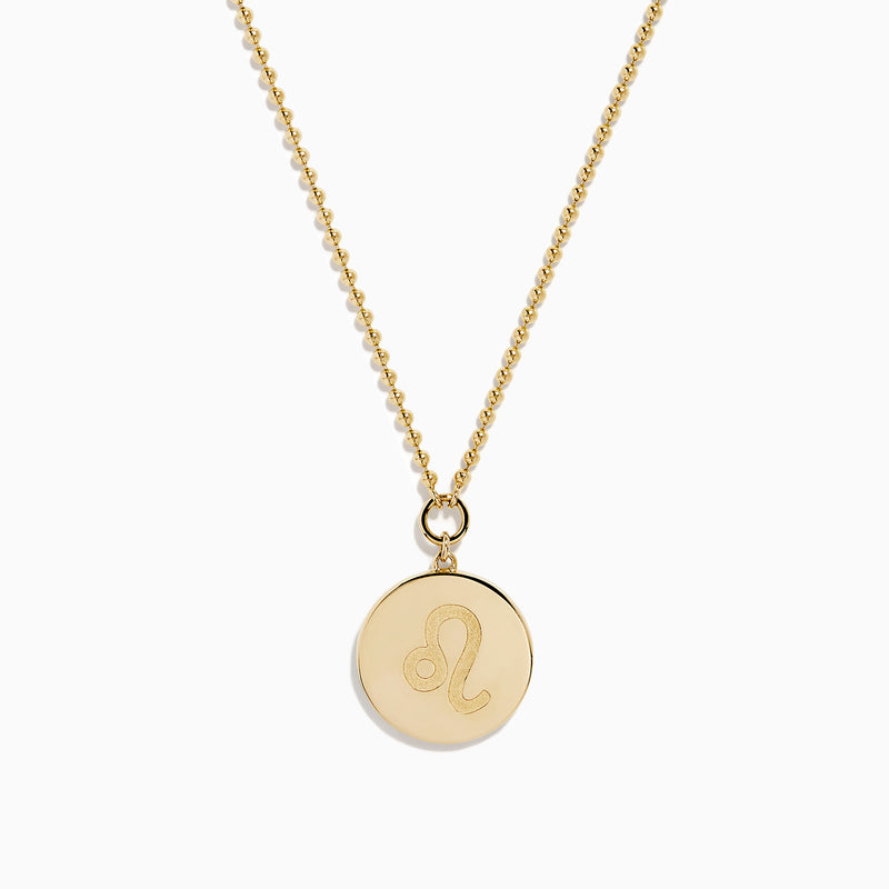 The Zodiac 14K Yellow Gold and Diamond Leo Necklace features a round pendant with an embossed lion design, bordered by sparkling diamonds on a delicate gold chain—an ideal statement piece for any Leo.
