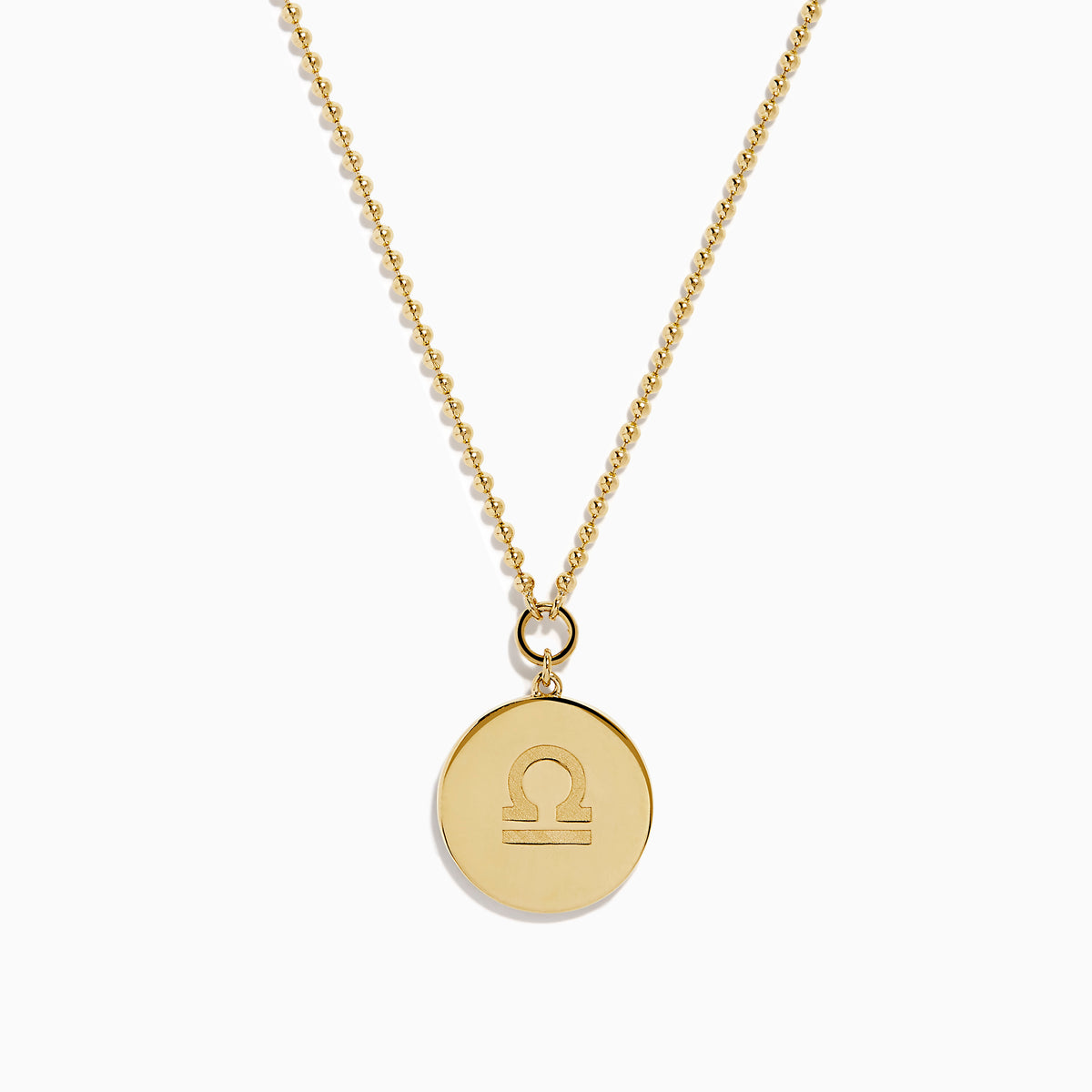 The Zodiac 14K Yellow Gold and Diamond Libra Necklace features a round pendant engraved with the scales of justice, surrounded by sparkling stones for a stunning astrological statement.