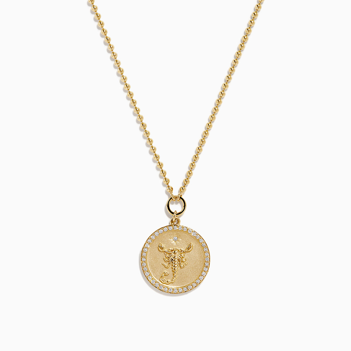 The Zodiac 14K Yellow Gold and Diamond Scorpio Necklace features a round pendant with an ornate Scorpio symbol bordered by sparkling diamonds.