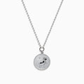 The Zodiac 925 Sterling Silver and Diamond Aries Necklace features a round sterling silver pendant with a textured edge, engraved Aries design, and hangs from a beaded chain.
