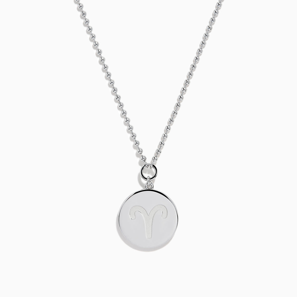 The Zodiac 925 Sterling Silver and Diamond Aries Necklace features a round sterling silver pendant with a textured edge, engraved Aries design, and hangs from a beaded chain.