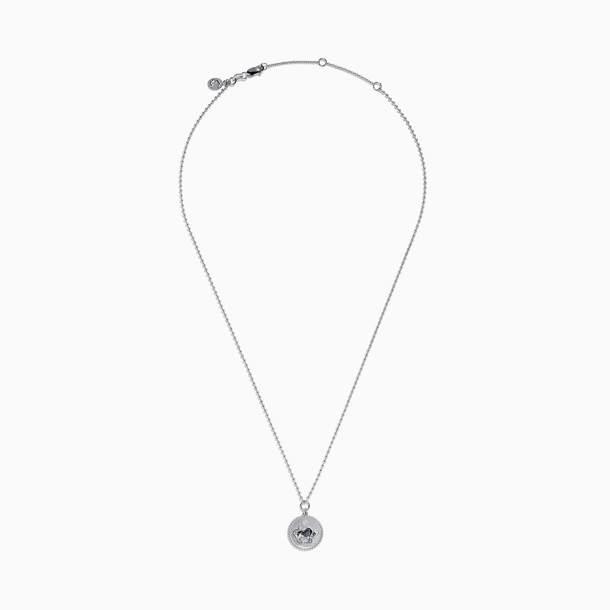 The Zodiac 925 Sterling Silver and Diamond Taurus Necklace features a round pendant with a raised bull design in the center, symbolizing Taurus, and is accented by a beaded edge.