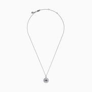 The Zodiac 925 Sterling Silver and Diamond Taurus Necklace features a round pendant with a raised bull design in the center, symbolizing Taurus, and is accented by a beaded edge.