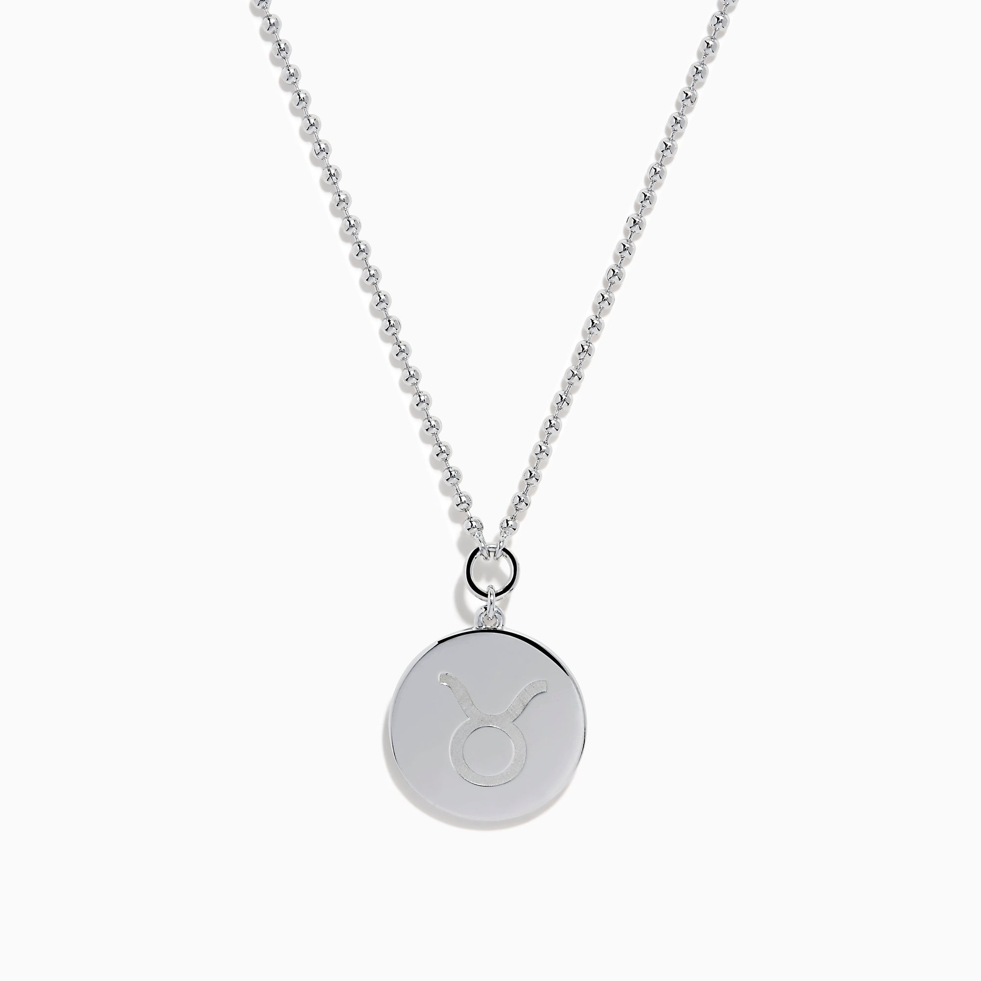 The Zodiac 925 Sterling Silver and Diamond Taurus Necklace features a round pendant with a raised bull design in the center, symbolizing Taurus, and is accented by a beaded edge.