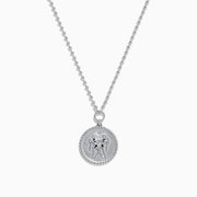 The Zodiac 925 Sterling Silver and Diamond Gemini Necklace features a round pendant engraved with two back-to-back human figures, shown against a plain white background.